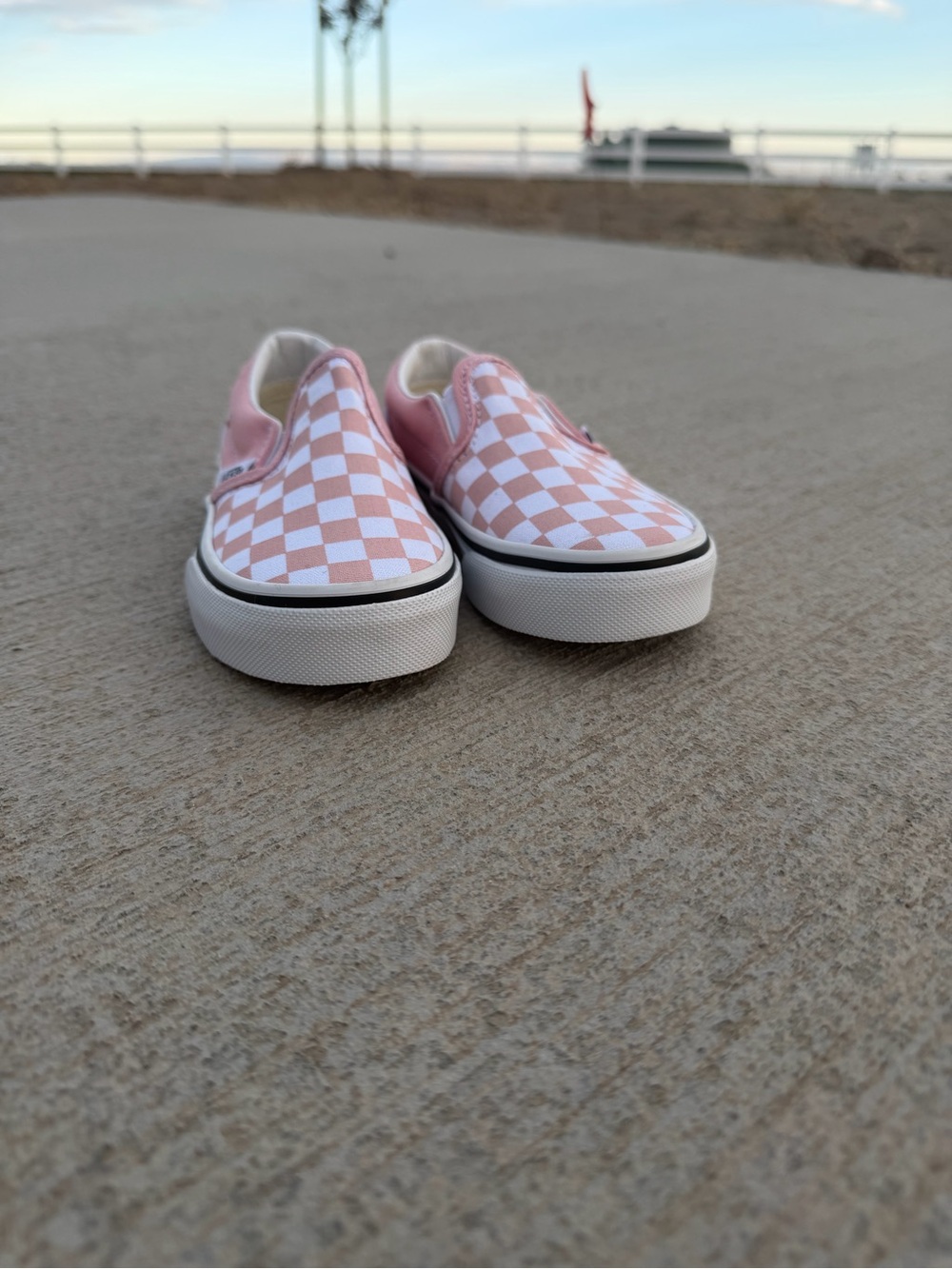 Vans Pink and White Checkerboard Slip-On Sneakers